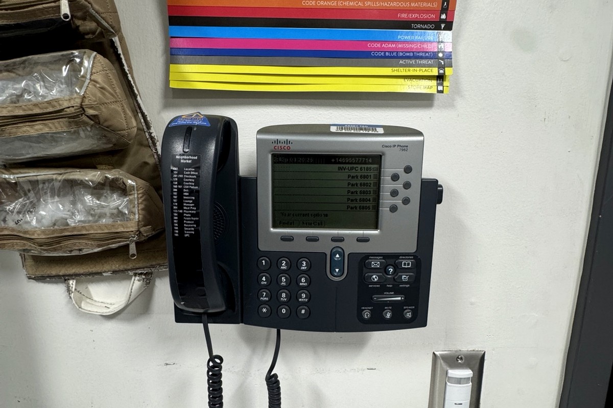 Business communication phone system installed on wall